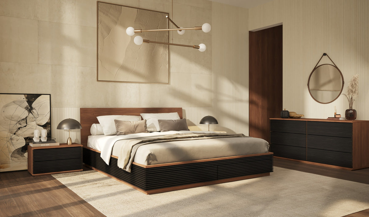 The Encino Collection in a warm bedroom: storage bed, nightstand and six-drawer dresser in walnut veneer with black slatted fronts